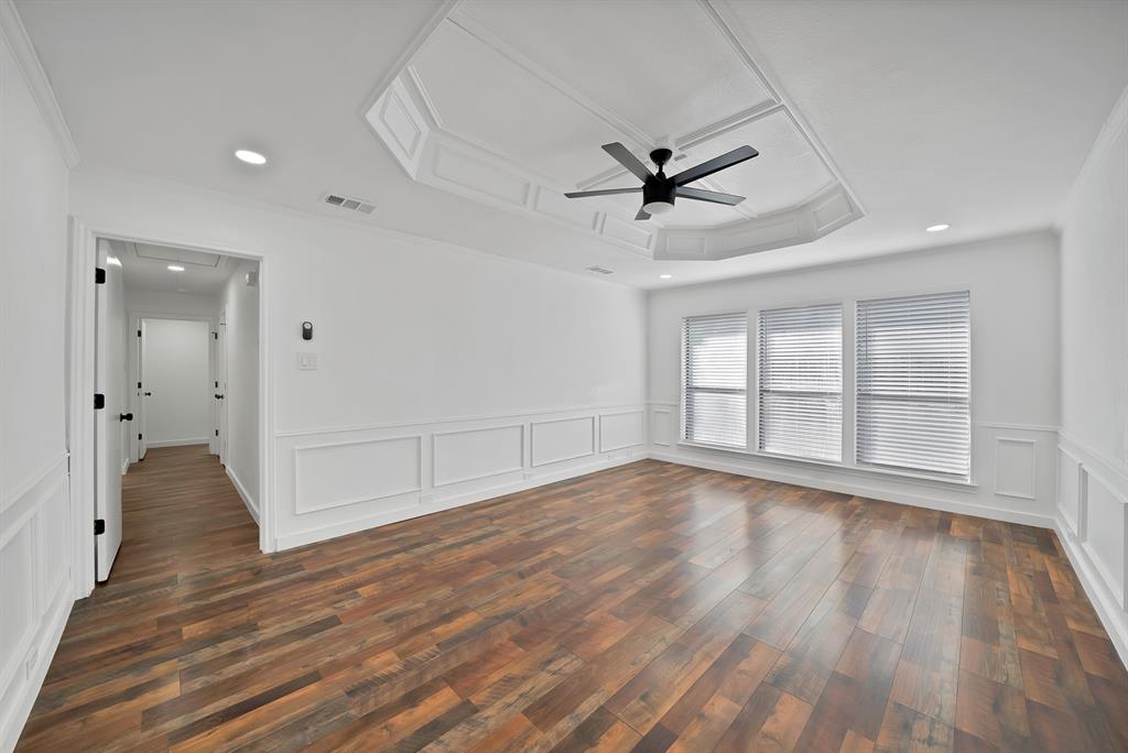 3410 Faulkner Drive Rowlett, TX 75088 - Photo 19 of 38 a view of empty room with wooden floor and fan