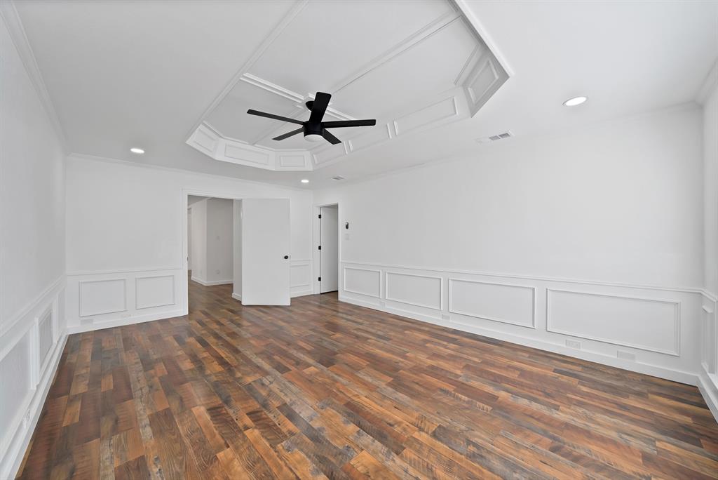3410 Faulkner Drive Rowlett, TX 75088 - Photo 20 of 38 a view of empty room with wooden floor and ceiling fan