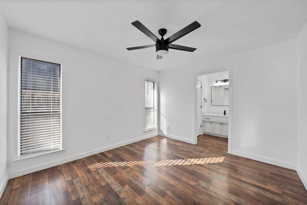 3410 Faulkner Drive Rowlett, TX 75088 - Photo 24 of 38 a view of empty room with wooden floor and window