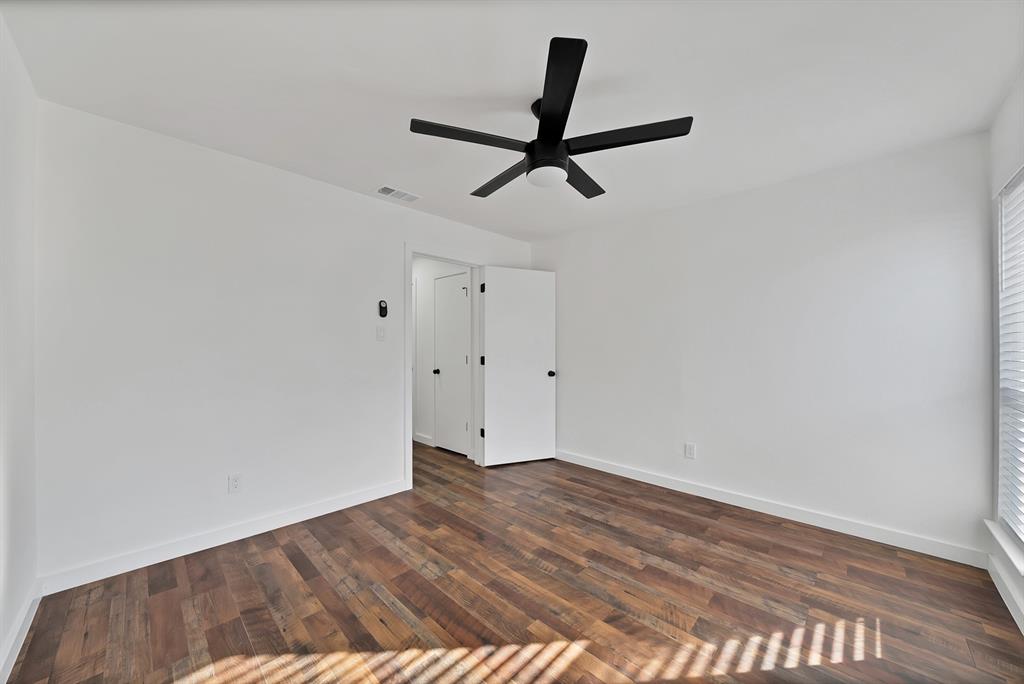 3410 Faulkner Drive Rowlett, TX 75088 - Photo 25 of 38 a view of empty room with wooden floor
