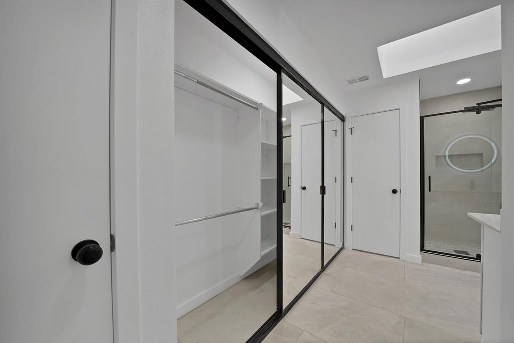 3410 Faulkner Drive Rowlett, TX 75088 - Photo 26 of 38 a bathroom with a shower and a tub