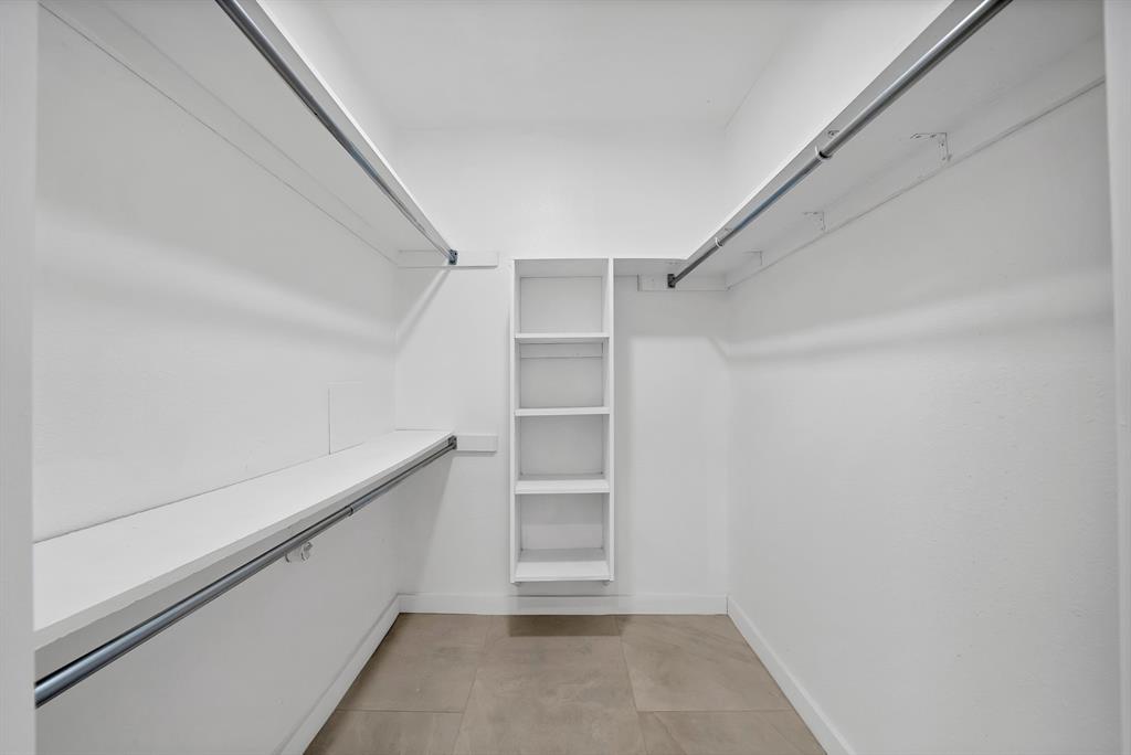 3410 Faulkner Drive Rowlett, TX 75088 - Photo 27 of 38 a view of an empty walk in closet