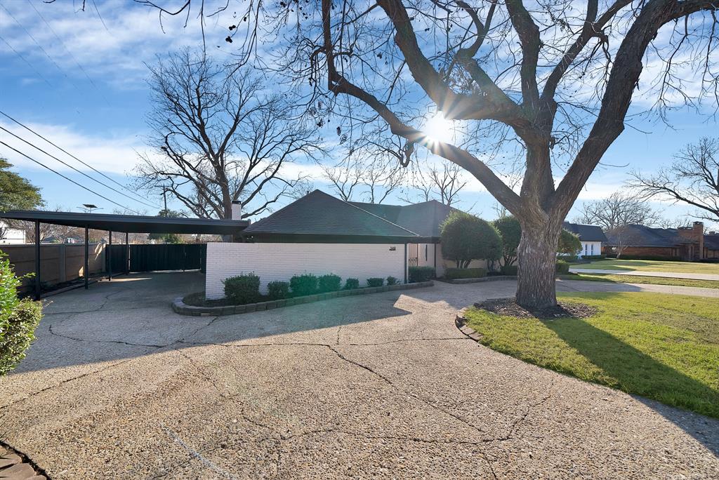 3410 Faulkner Drive Rowlett, TX 75088 - Photo 3 of 38 a view of a house with a yard