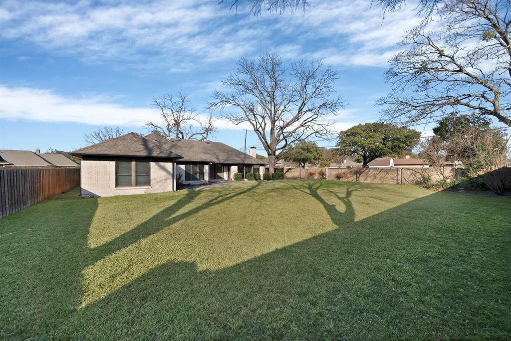 3410 Faulkner Drive Rowlett, TX 75088 - Photo 37 of 38 a view of a house with a swimming pool