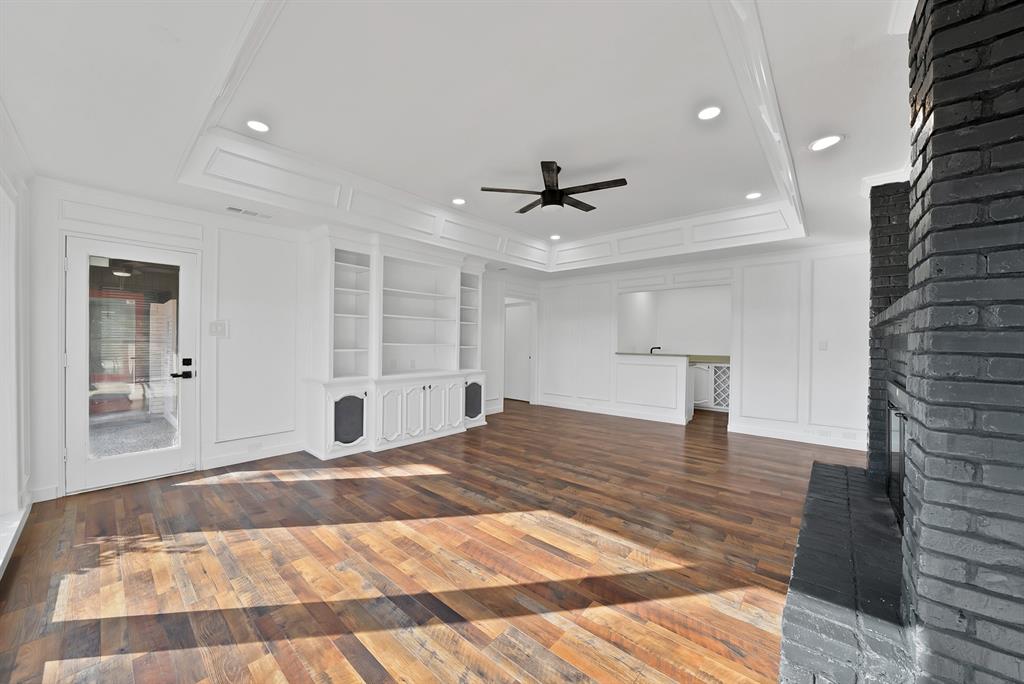 3410 Faulkner Drive Rowlett, TX 75088 - Photo 7 of 38 a bedroom with a bed and a lamp on a dresser
