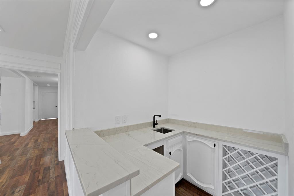 3410 Faulkner Drive Rowlett, TX 75088 - Photo 9 of 38 a view of a room with rack on the wall