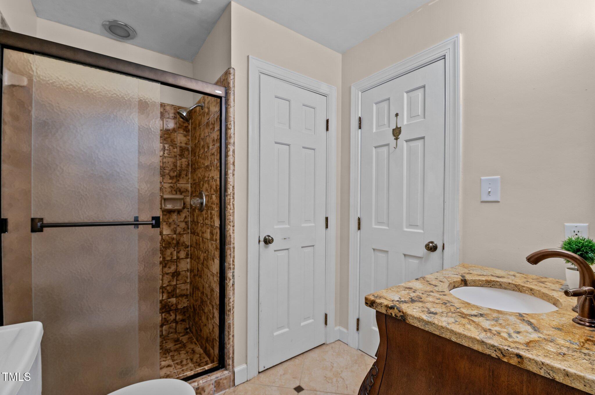 7317 Mill Ridge Road Raleigh, NC 27613 - Photo 17 of 30 Primary Bathroom