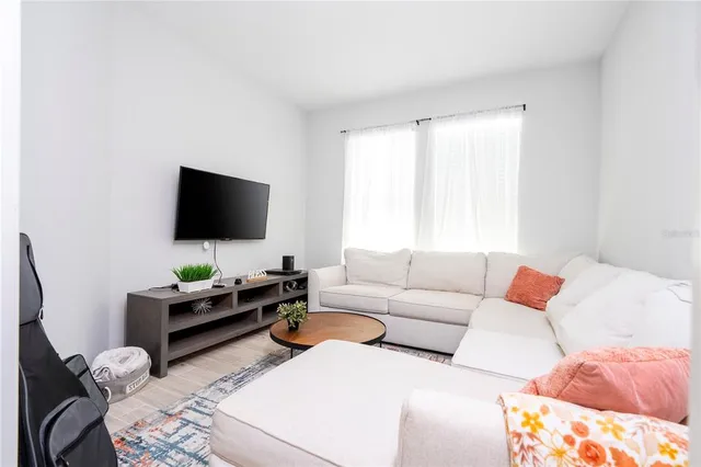 a view of a living room and bathroom
