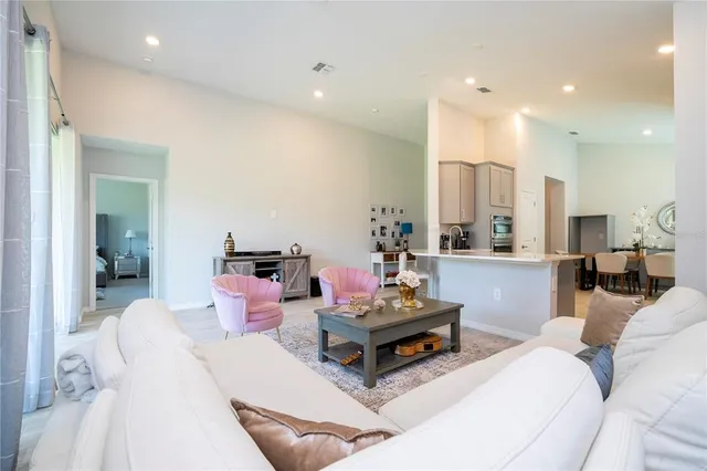 a kitchen with sink cabinets and stove