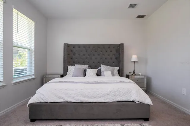 a bathroom with a sink a vanity and a mirror