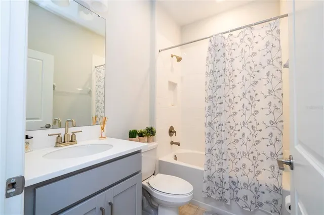 a view of a swimming pool in a backyard