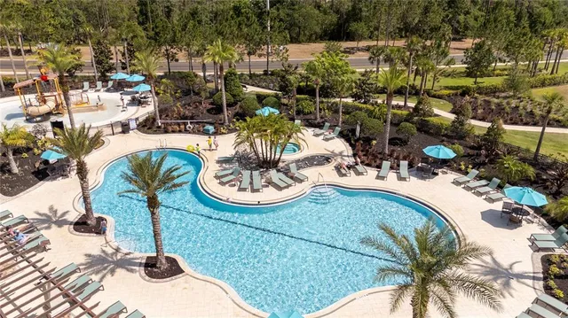 a view of a swimming pool and outdoor space