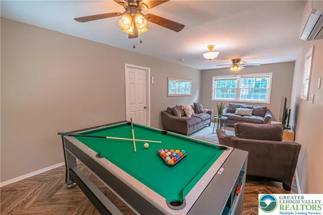 a bedroom with a bed and a dresser in it