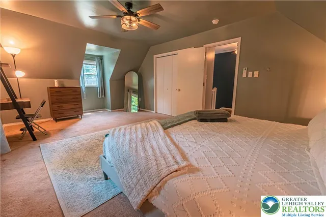 a view of a backyard with a lake view