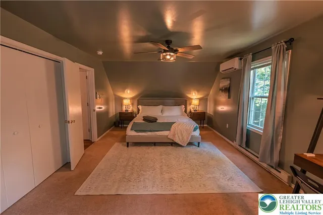 a view of a garden with a building in the background