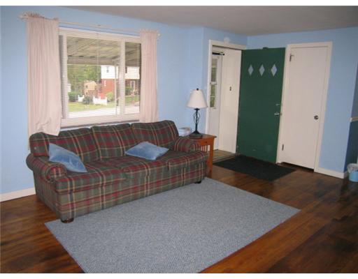 561 Patterson Road Bethel Park, PA 15102 - Photo 2 of 9 Living Room. Large living room with gleaming hardwood floors and open floor plan to dining room