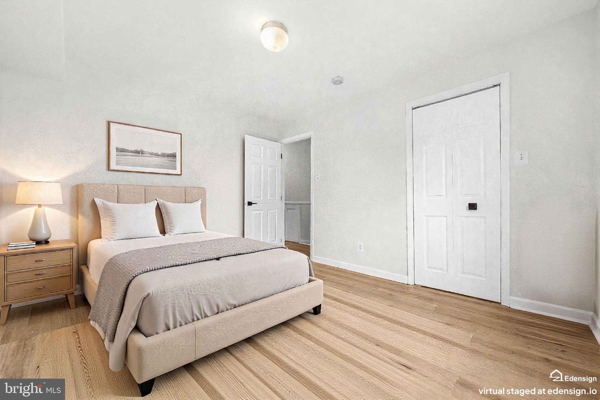 635 Waterloo Road, Unit 222 Warrenton, VA 20186 - Photo 23 of 28 a bedroom with a bed and a night stand