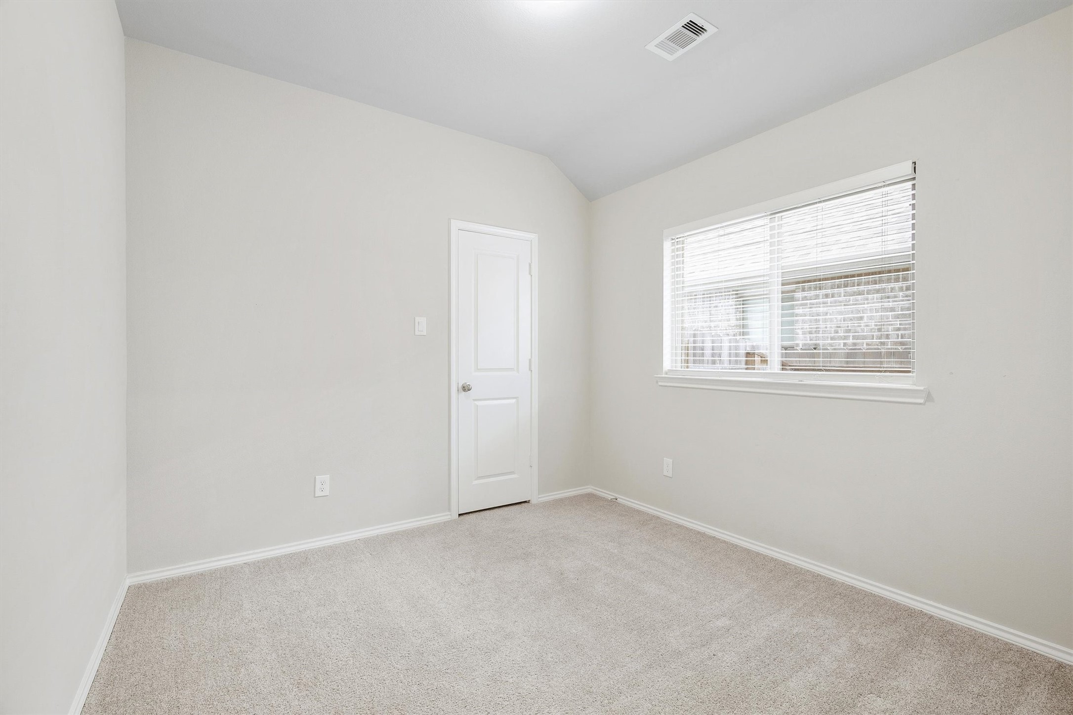 17270 Wild Watermelon Way Conroe, TX 77302 - Photo 17 of 28 Bright, carpet, a closet, and a window that lets the light in. Whether it becomes a guest room, a home office, or a nursery, this room is ready to be whatever you need it to be.