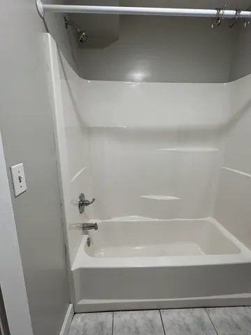a bathroom with a bathtub