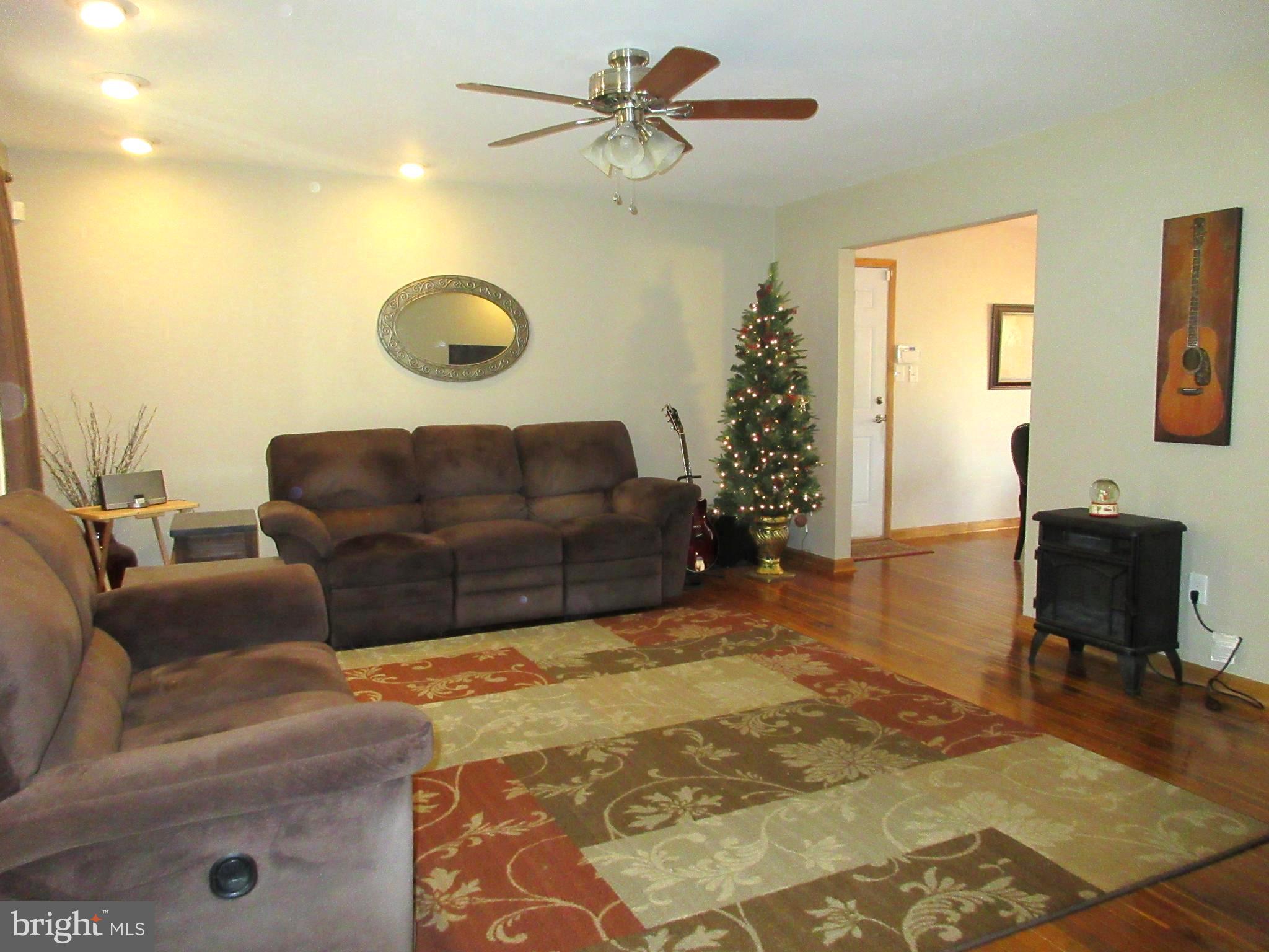 13320 Santa Anita Road Laurel, MD 20708 - Photo 3 of 32 Living Room is open with hardwood floors