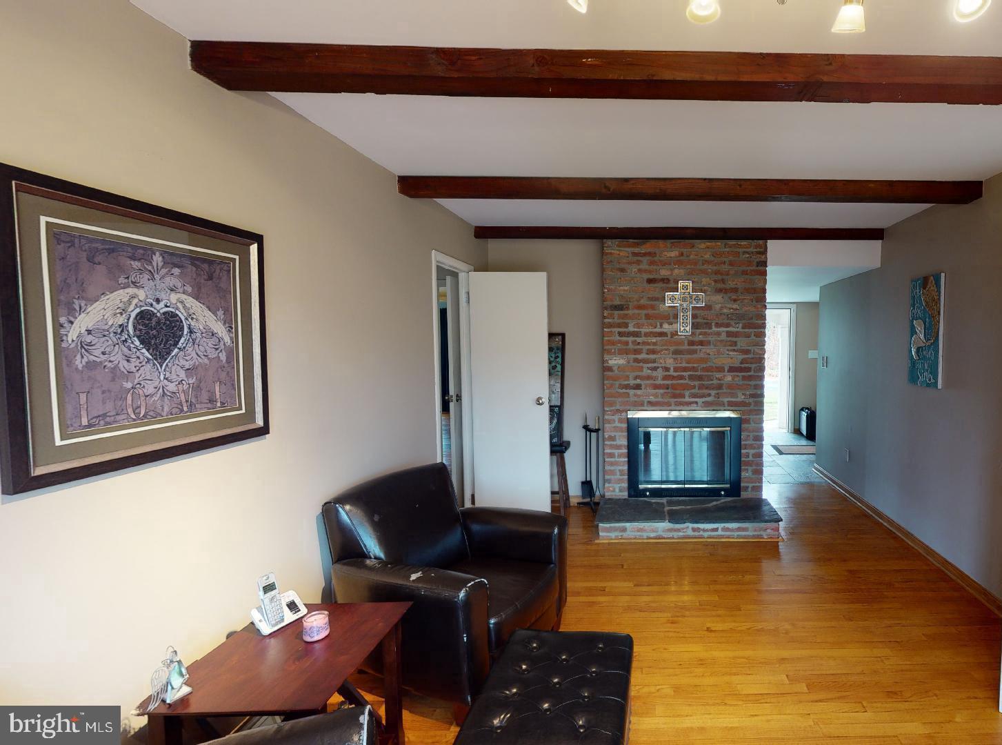 13320 Santa Anita Road Laurel, MD 20708 - Photo 7 of 32 Family room has wood burning fireplace