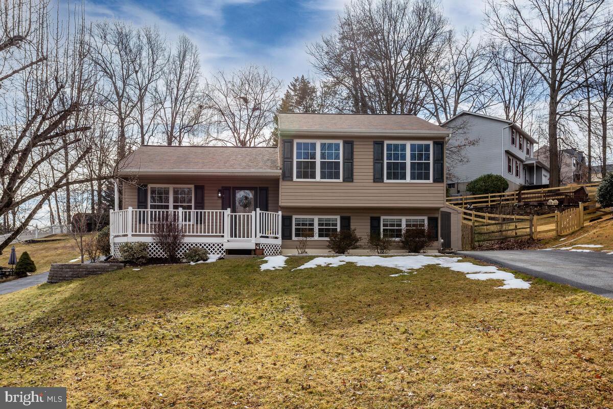 6186 Fairbourne Court Hanover, MD 21076 - Photo 1 of 1 a view of a house with a yard covered with snow in the patio