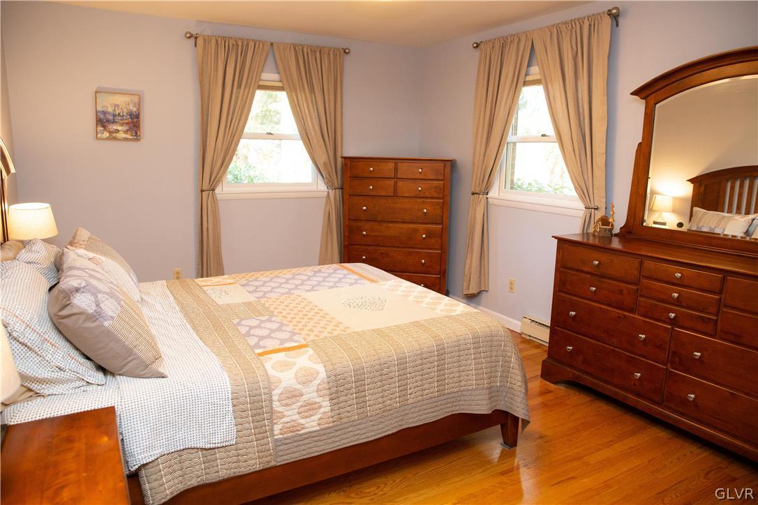 1909 Blue Barn Road Orefield, PA 18069 - Photo 14 of 39 a bedroom with a bed and a window