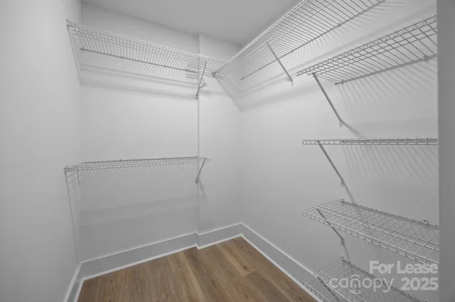 a view of a room with racks on the wall