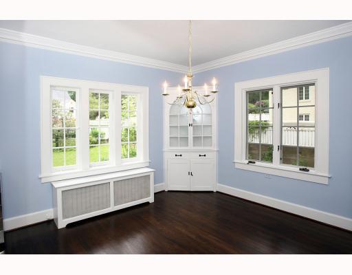 67 Middlesex Road Darien, CT 06820 - Photo 4 of 8 a view of an empty room with a window and wooden floor