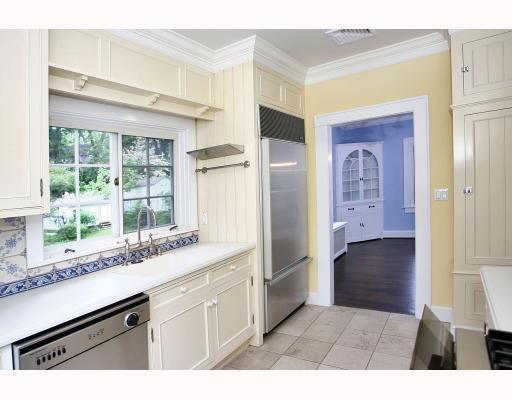 67 Middlesex Road Darien, CT 06820 - Photo 6 of 8 a kitchen with a refrigerator and a sink