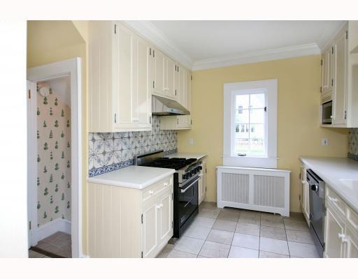 67 Middlesex Road Darien, CT 06820 - Photo 7 of 8 a kitchen with a stove a sink and a refrigerator