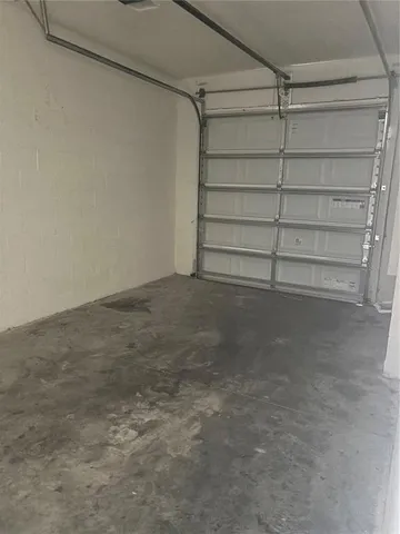 a view of an empty room and a empty shelves