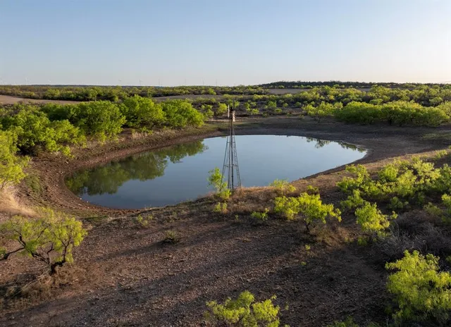 a view of a lake with a city