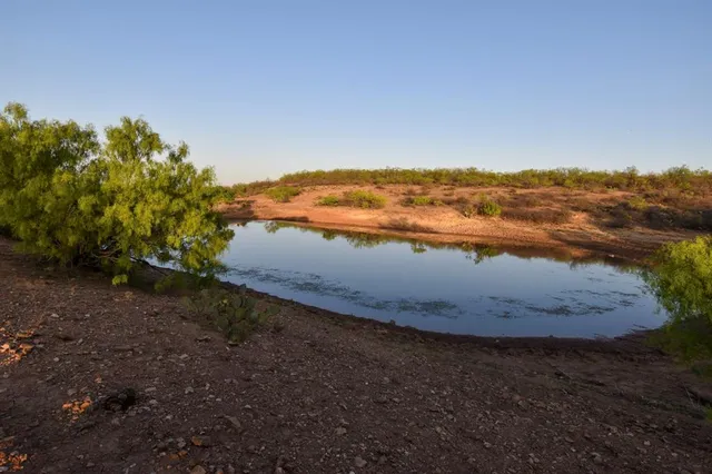 a view of a lake with a mountain