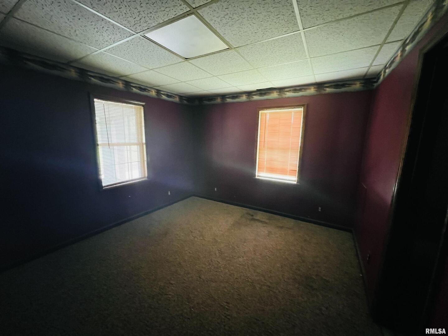 2417 1st Street Eldorado, IL 62930 - Photo 15 of 21 a view of empty room with windows