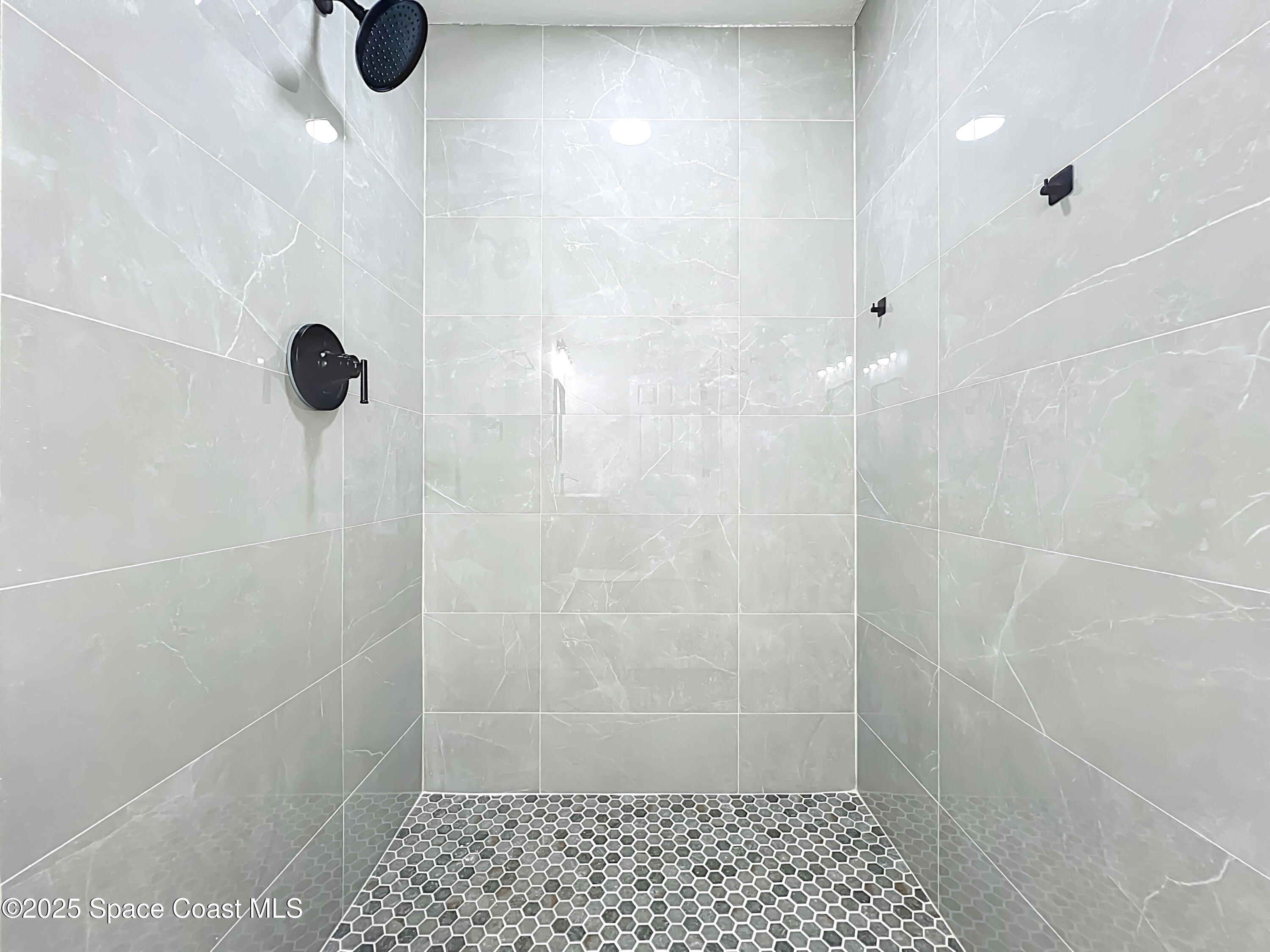 2340 Iowa Drive Melbourne, FL 32935 - Photo 18 of 47 a bathroom with a shower