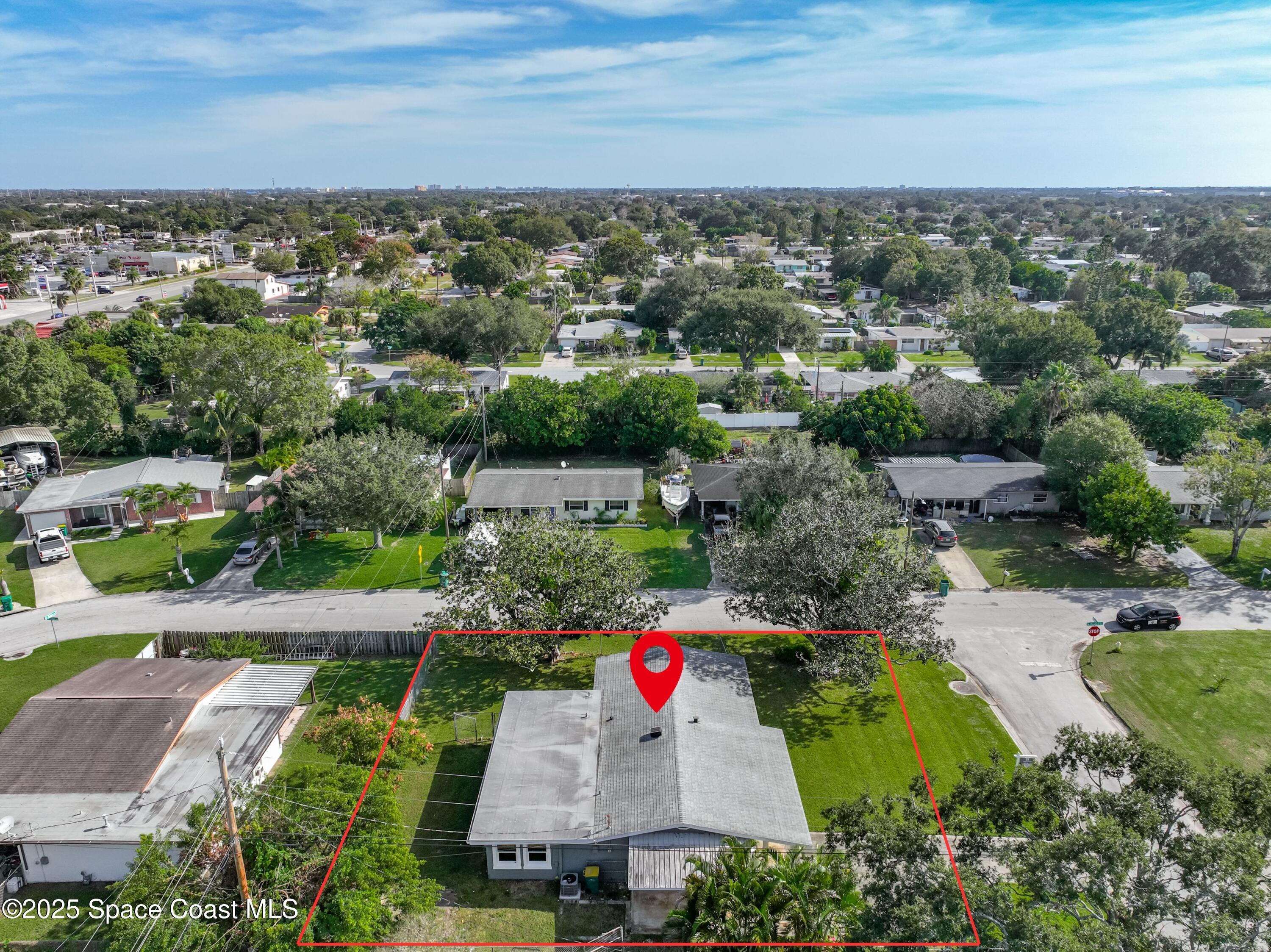 2340 Iowa Drive Melbourne, FL 32935 - Photo 44 of 47 an aerial view of residential houses with outdoor space and ocean view