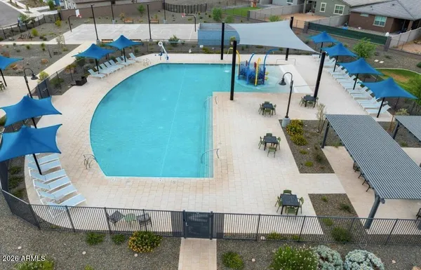 an aerial view of a house with swimming pool