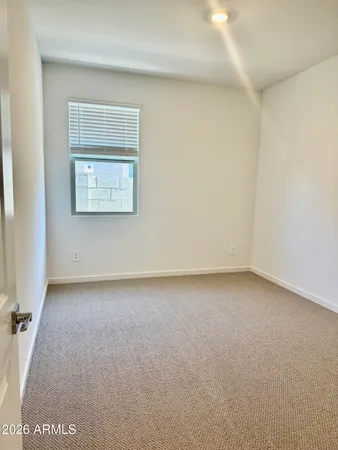 en empty room with windows