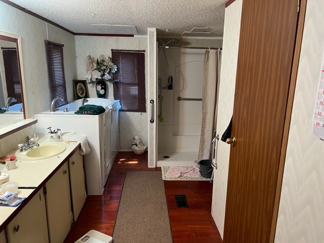 147 Philpot Road Ardmore, TN 38449 - Photo 11 of 21 a bathroom with a sink a toilet and shower