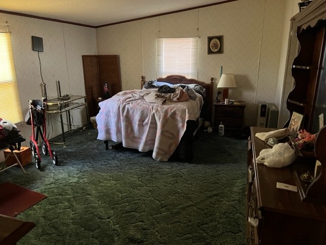 147 Philpot Road Ardmore, TN 38449 - Photo 10 of 21 a bedroom with bed and a flat tv screen