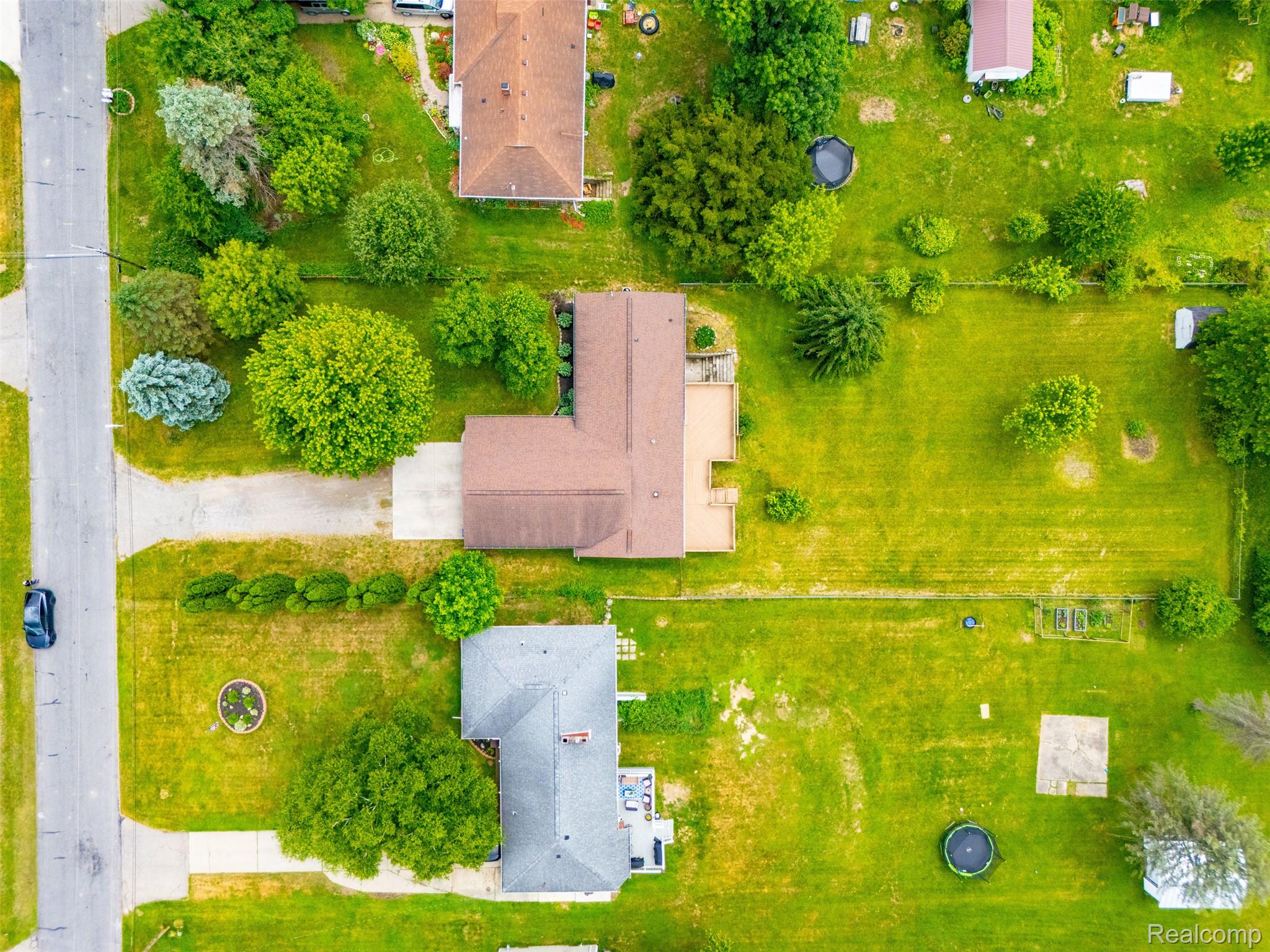4420 Dublin Road Burton, MI 48529 - Photo 53 of 56 Expansive lot with lush green lawn