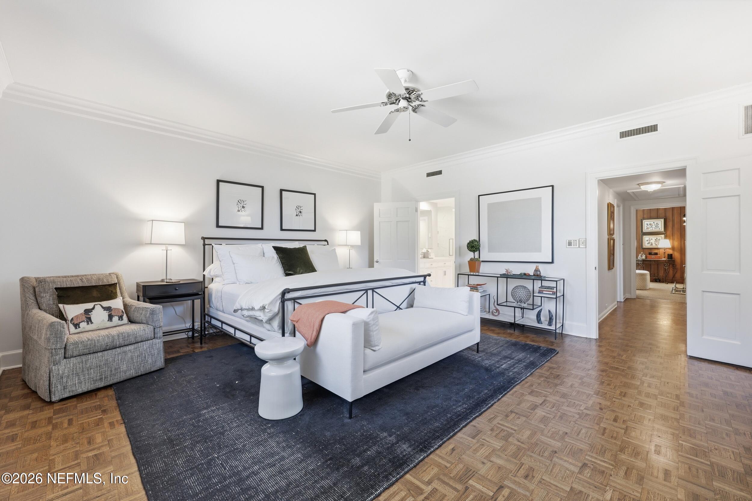 4706 Ivanhoe Road Jacksonville, FL 32210 - Photo 21 of 47 a bedroom with a white bed and white walls