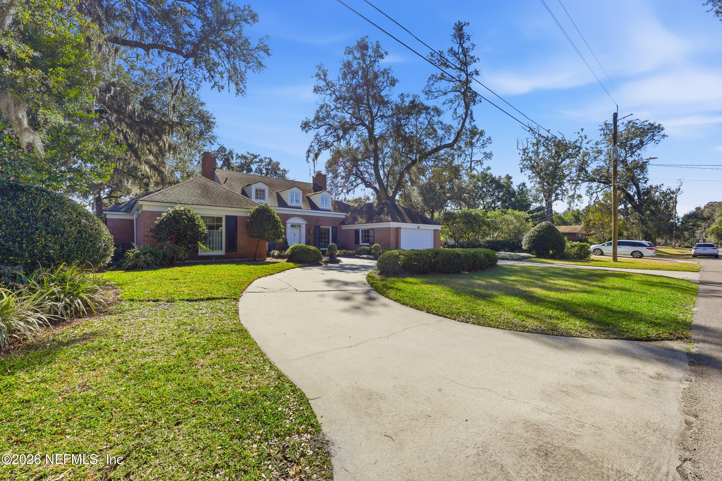 4706 Ivanhoe Road Jacksonville, FL 32210 - Photo 46 of 47 a view of a house with a yard