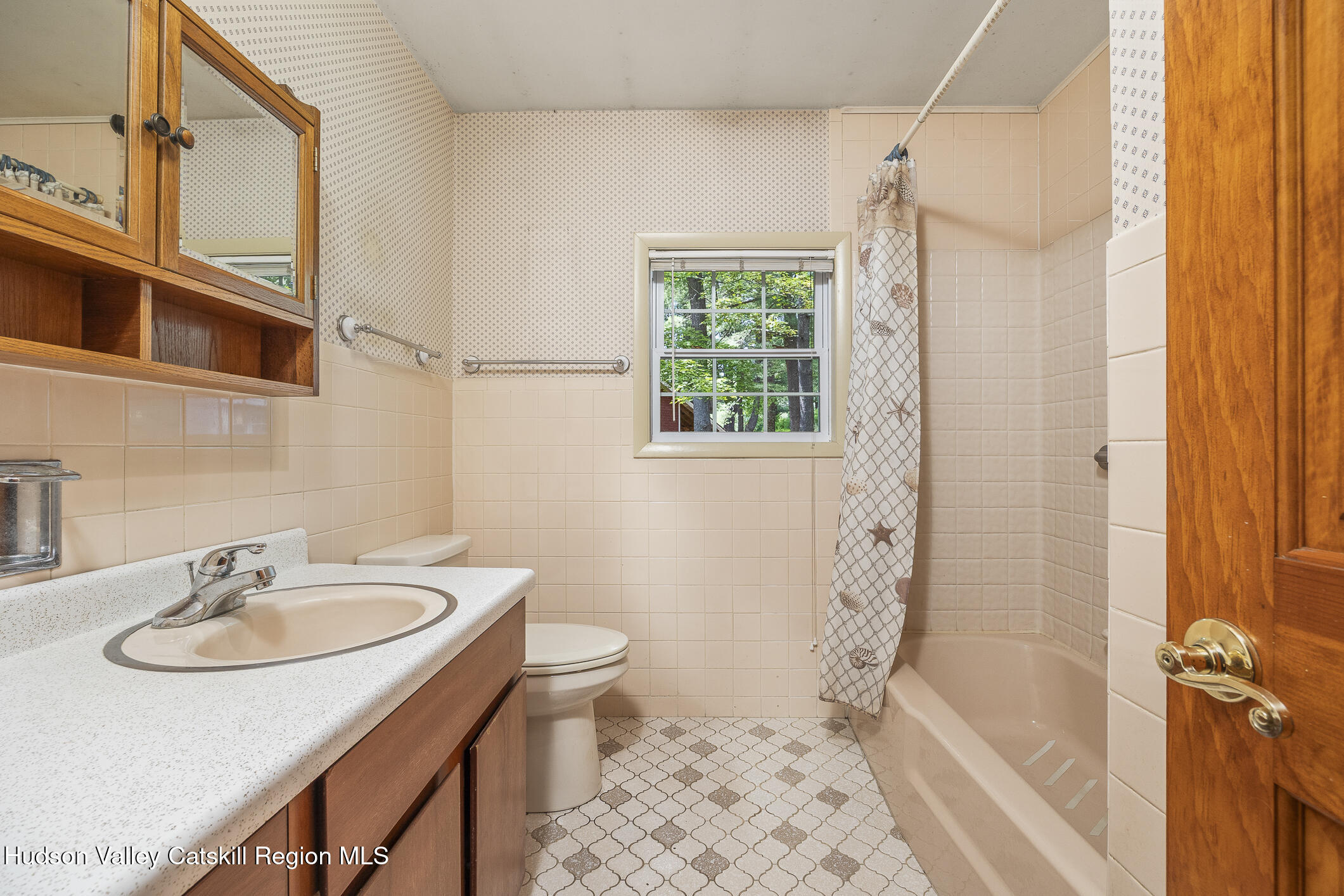 174 Co Rte 11 Pine Plains, NY 12567 - Photo 15 of 37 a bathroom with a sink toilet a shower and a mirror