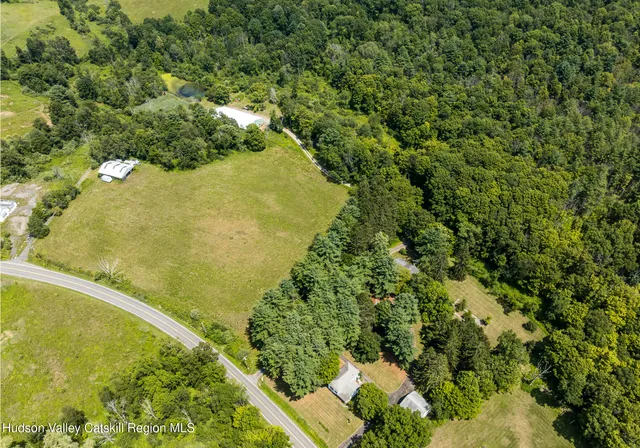 a view of a lake with a yard