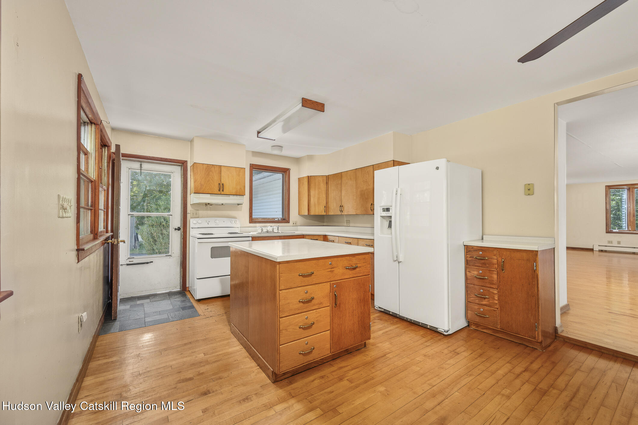 174 Co Rte 11 Pine Plains, NY 12567 - Photo 24 of 37 a kitchen with stainless steel appliances granite countertop a refrigerator and a stove top oven