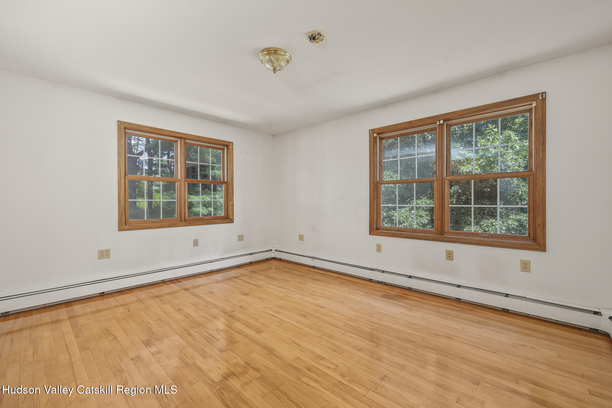 174 Co Rte 11 Pine Plains, NY 12567 - Photo 29 of 37 a view of an empty room with a window