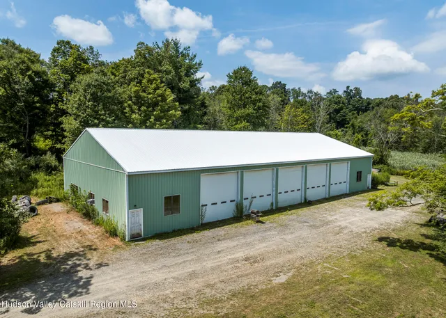 walk in garage with furniture