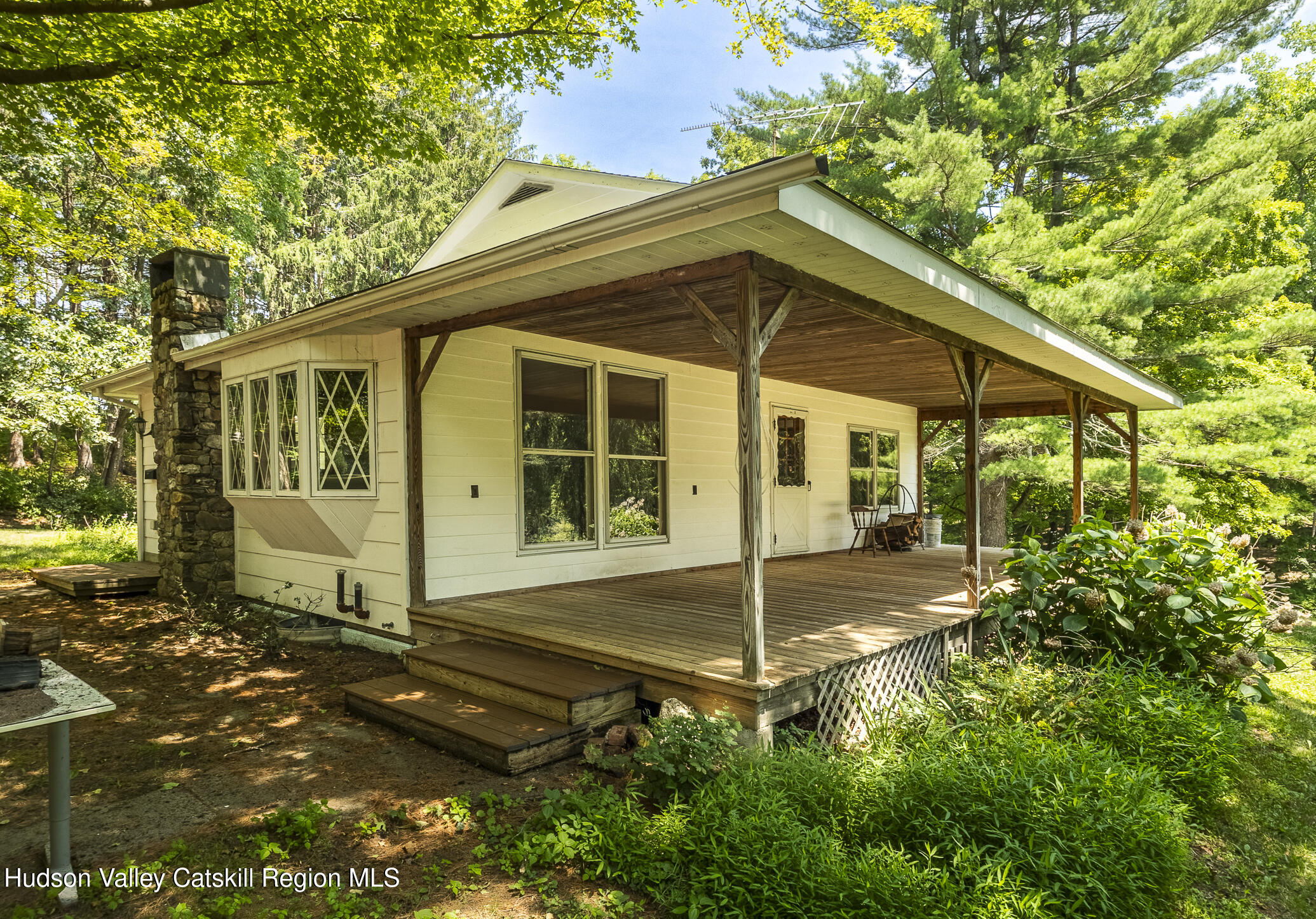 174 Co Rte 11 Pine Plains, NY 12567 - Photo 7 of 37 a backyard of a house with table and chairs